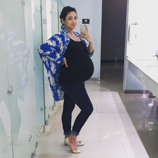 Mandatory bathroom selfie. This super soft maternity jeans has been my best friend for 36 weeks.